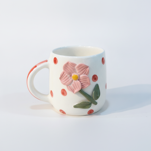 Handcrafted Floral Relief Ceramic Mug with Polka Dots