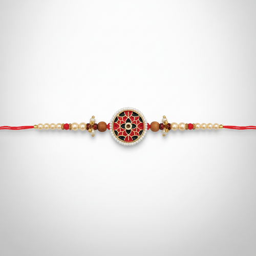 Handcrafted Meenakari Rakhi with Pearl & Red Bead String