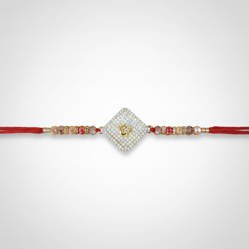 Om Diamond-Cut Rakhi with Red Thread & Crystal Beads