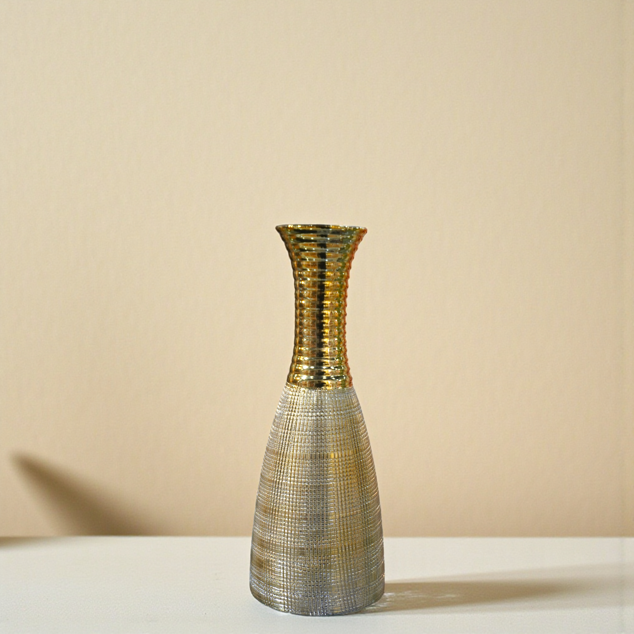 A hammered metal vase for home Decoration | Gold