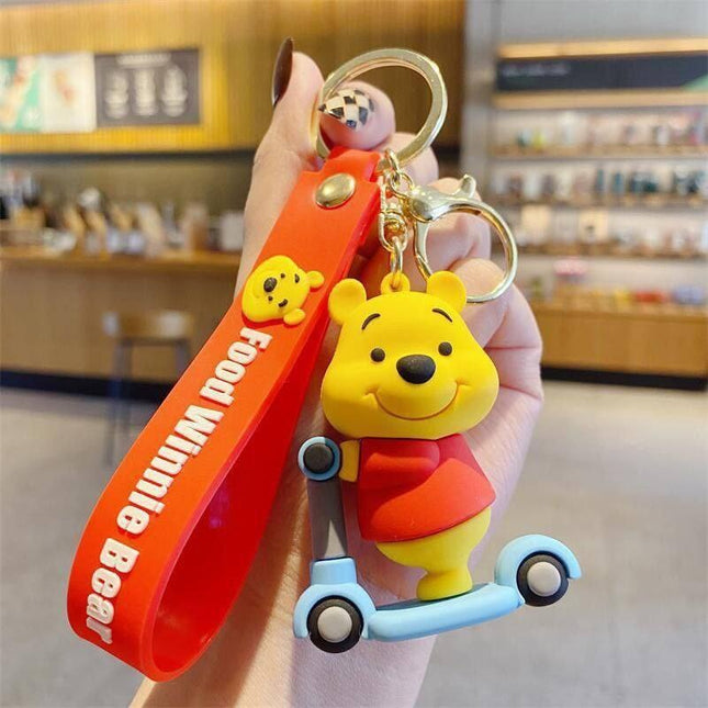 Winnie Pooh on Skates Rubber Keychain