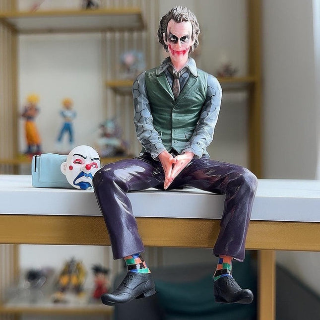 Joker Action figure Superhero Sitting With a Mask And Suitcase