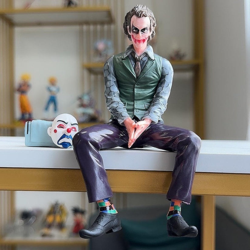 Joker Action figure Superhero Sitting With a Mask And Suitcase