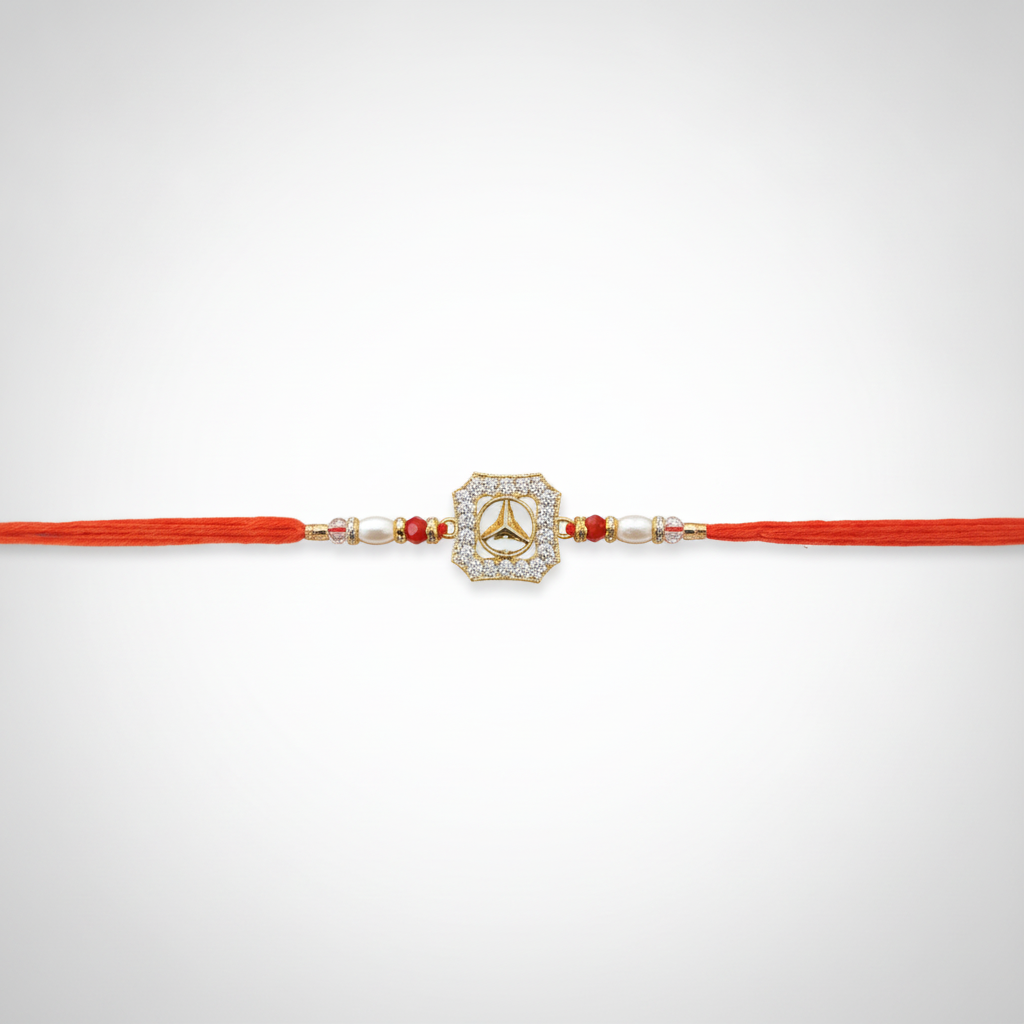 Elegant Diamond-Cut Rakhi with Red Beads & Pearl Accents