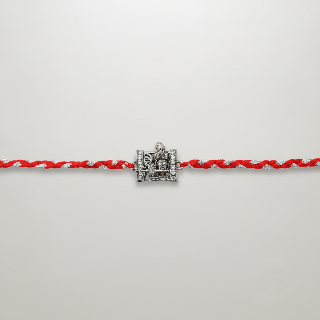 Silver & Red Braided Rakhi with Temple Charm