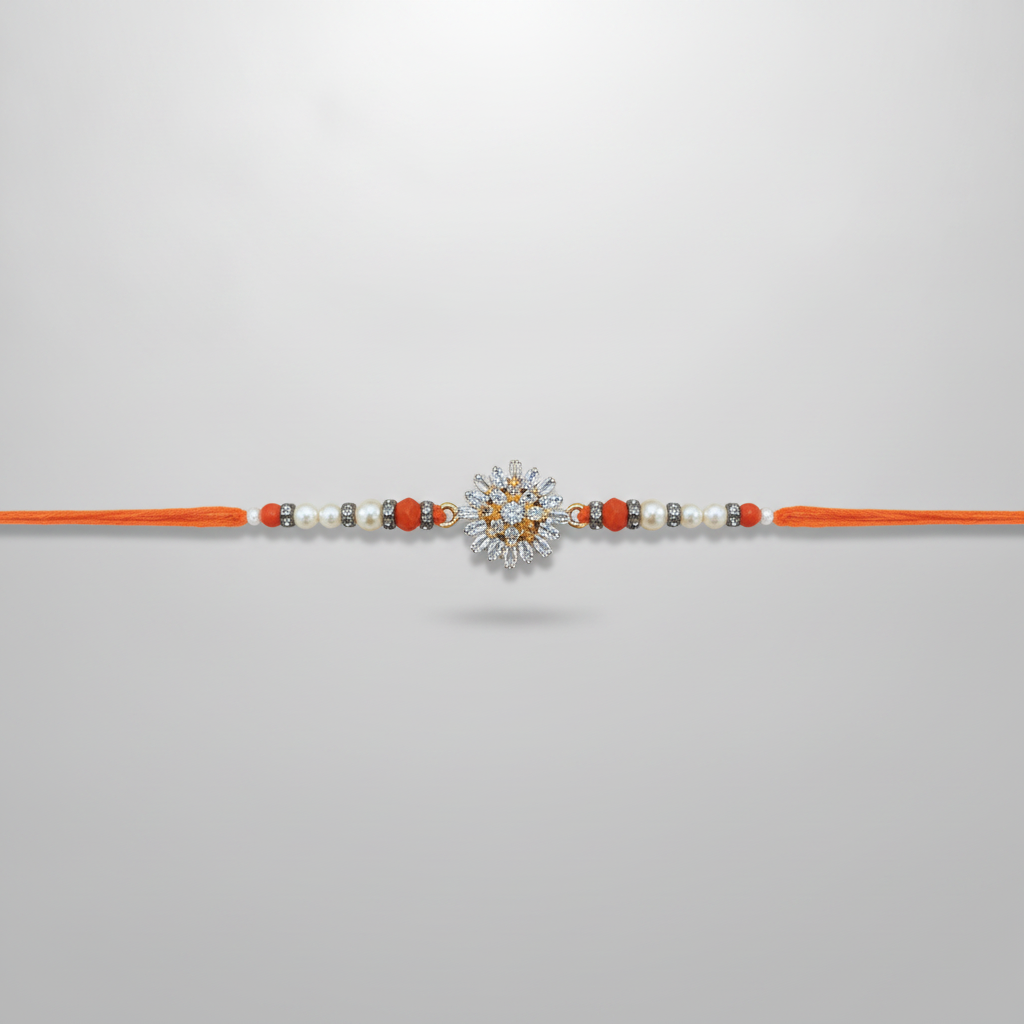 Crystal Sunburst Rakhi with Pearl & Red Beads