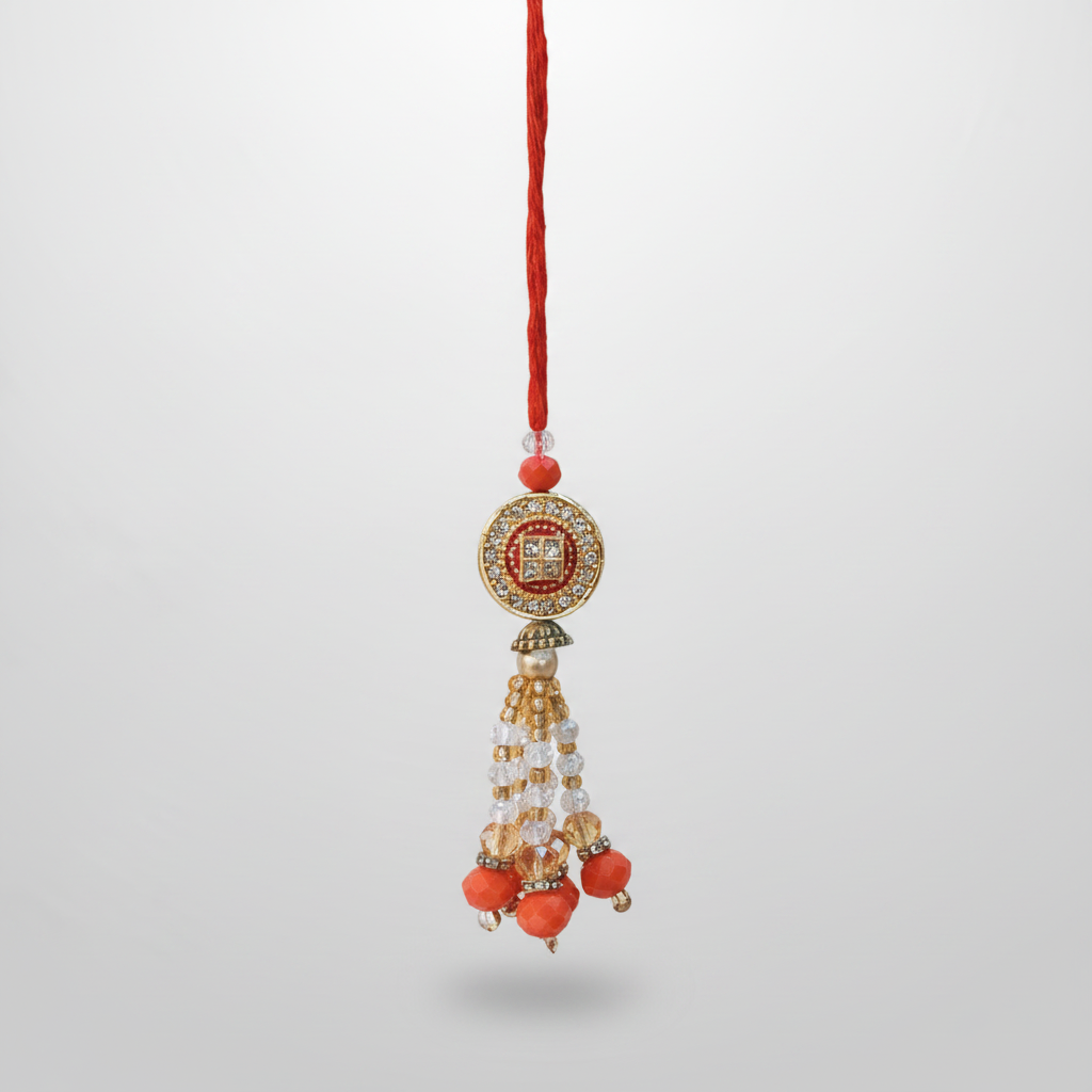 Traditional Beaded Rakhi with Crystal Tassel & Gold Medallion