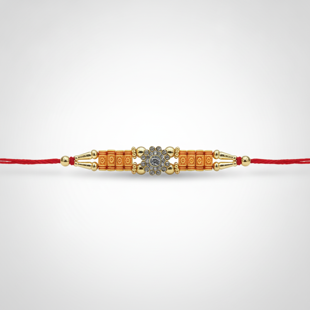 Traditional Gold & Crystal Rakhi with Red Thread