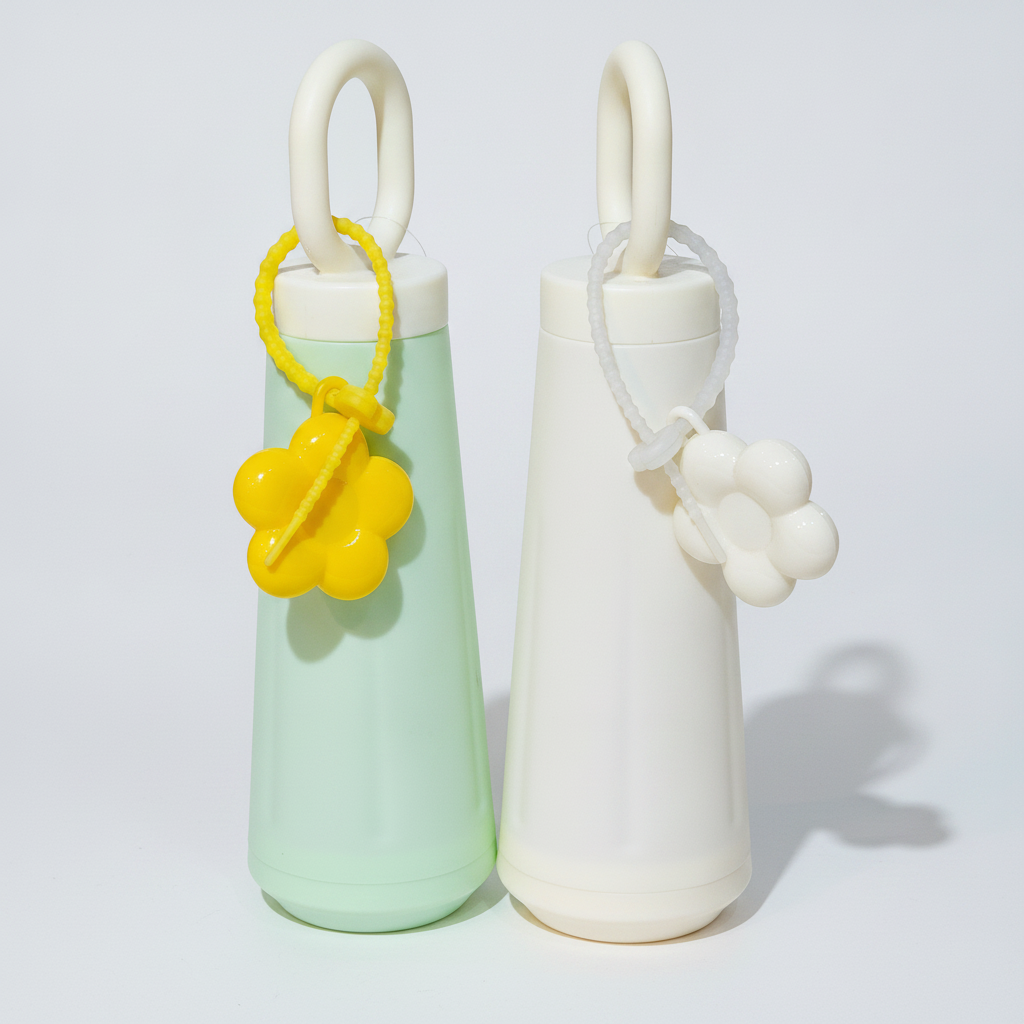 Aesthetic Loop-Handle Glass Bottle with Flower Charm