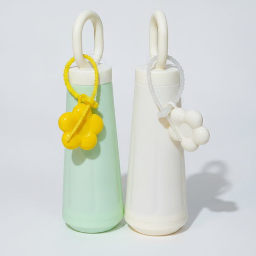 Aesthetic Loop-Handle Glass Bottle with Flower Charm