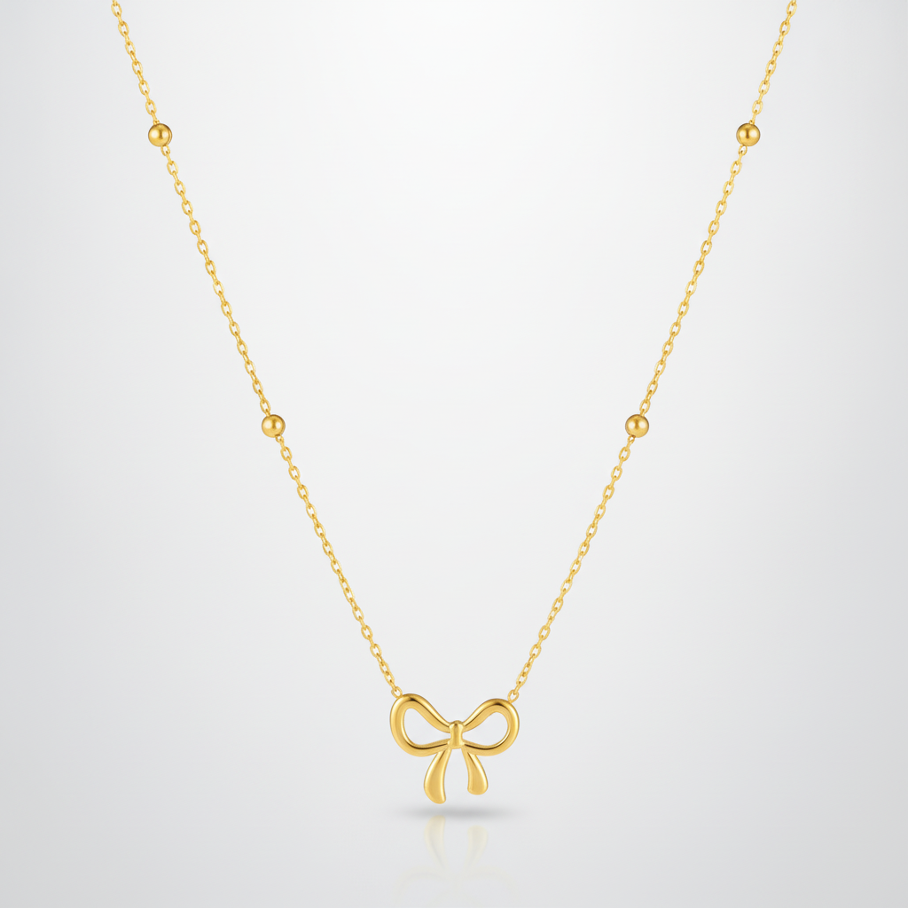 Gold Bow Pendant Necklace with Beaded Chain