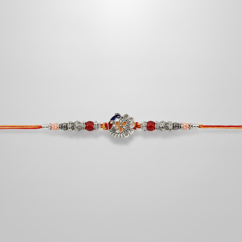 Peacock Meenakari Rakhi with Red Beads & Silver Charms