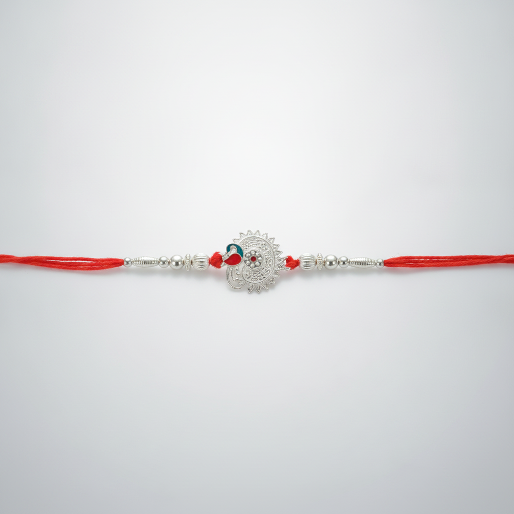 Silver Ganesha Rakhi with Red Thread & Silver Beads