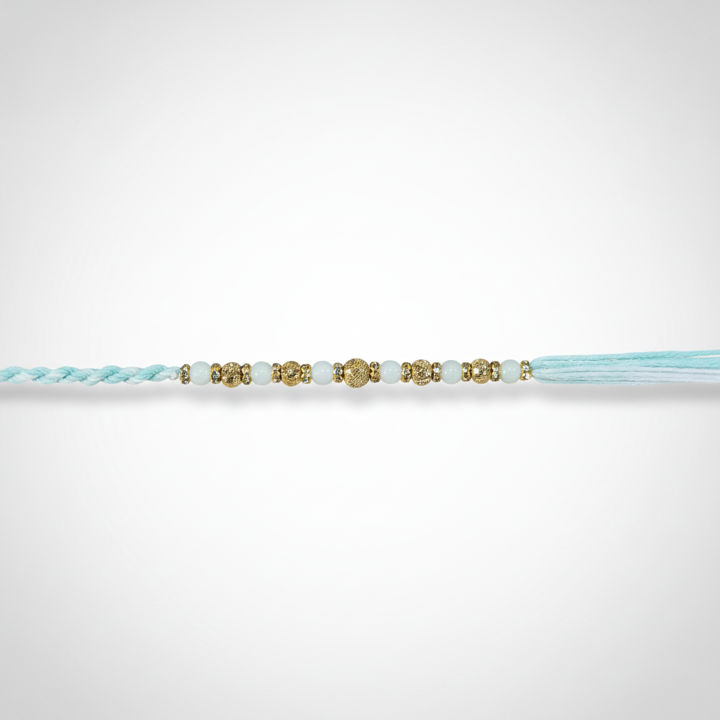 Delicate Sky Blue & Gold Beaded Rakhi Bracelet