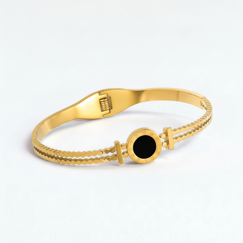 Gold-Tone Bangle Bracelet with Black Roman Numeral Disc