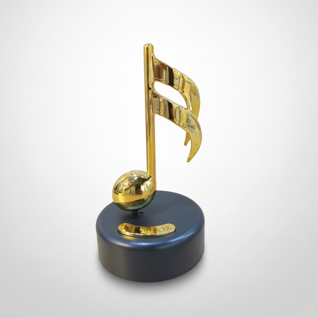 Golden Musical Note Music Box – Spinning Decorative Figurine