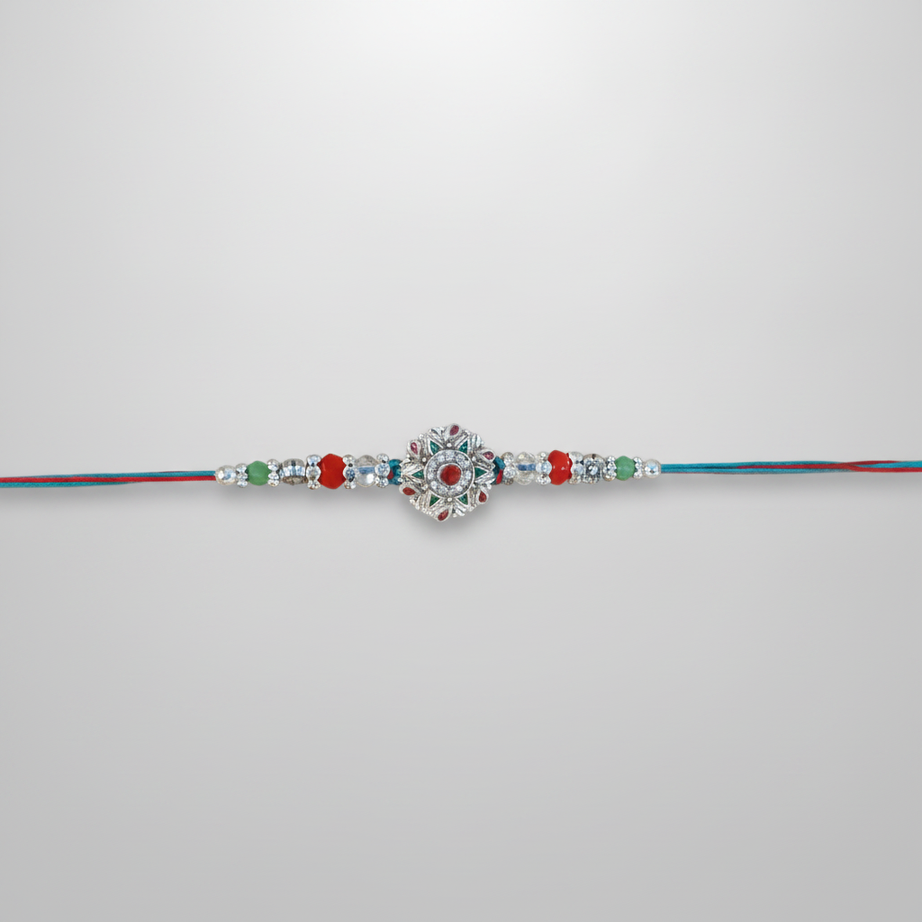 Silver Floral Rakhi with Red & Green Crystal Beads